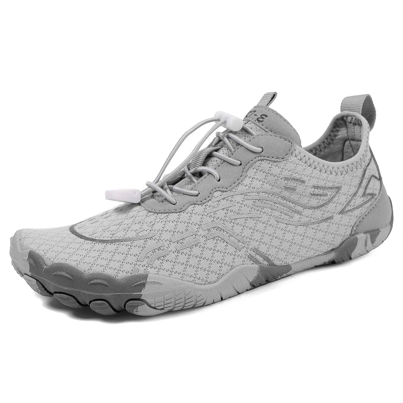 Gray low-top lace-up barefoot shoes with flexible tread sole and breathable knit upper.