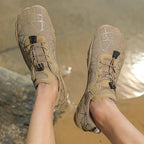 Earth brown waterproof barefoot sneakers with lace-up closure and rugged tread