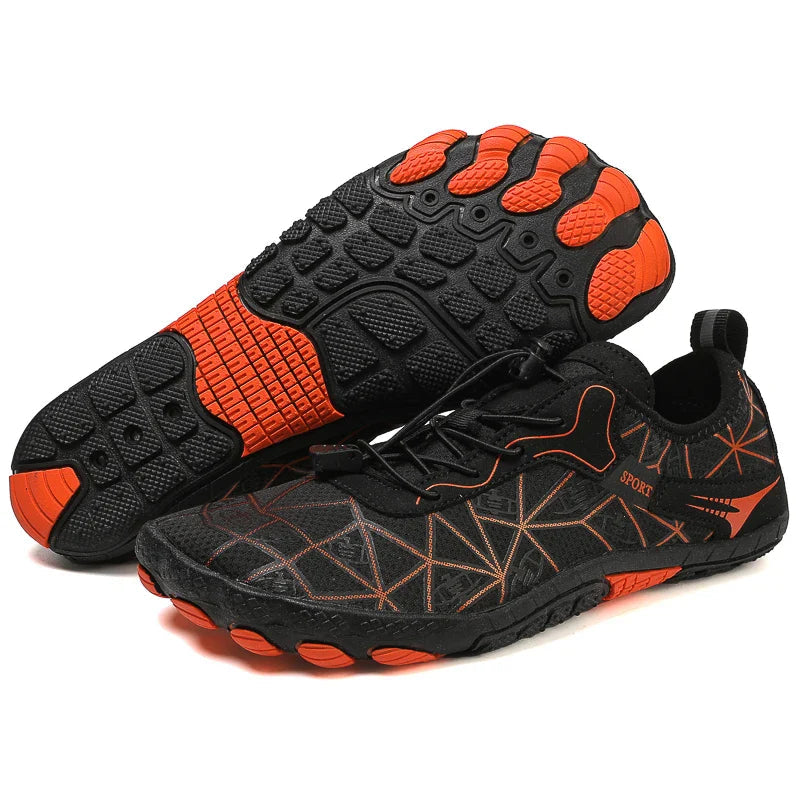 Black waterproof barefoot sneakers with orange soles and patterned rubber outsole