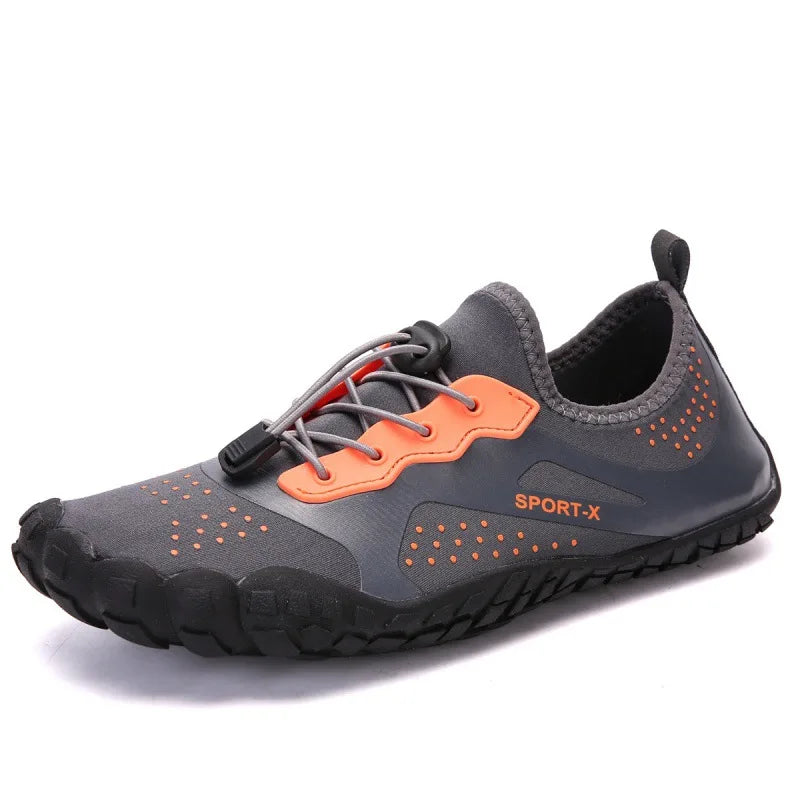 Unisex waterproof barefoot water shoe in gray with orange lace panel, sport-x logo, tread sole