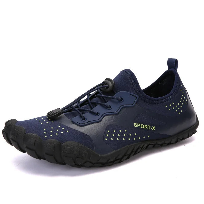 Unisex waterproof barefoot water shoe in navy blue with green laces, textured upper, grippy sole