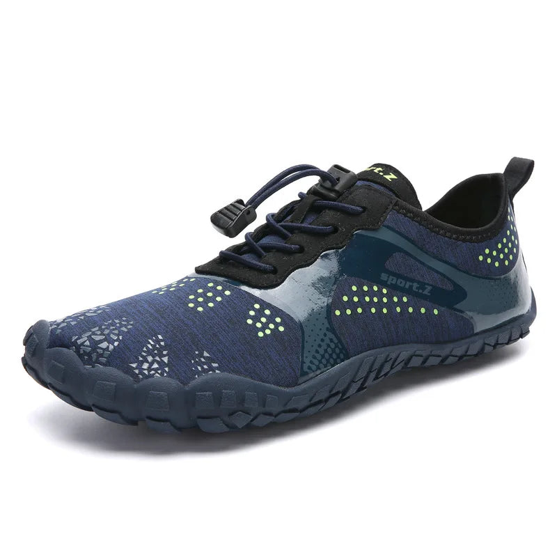 Unisex waterproof barefoot water shoe in blue with green dotted accents, lace-up style, sporty sole