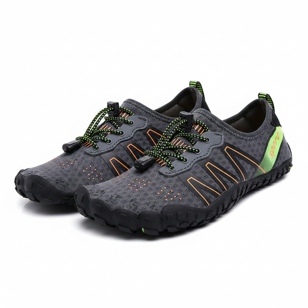 Grey water shoes with green laces and orange accents, slip-on athletic barefoot design