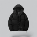 Black unisex winter puffer jacket with attached hood and front zipper
