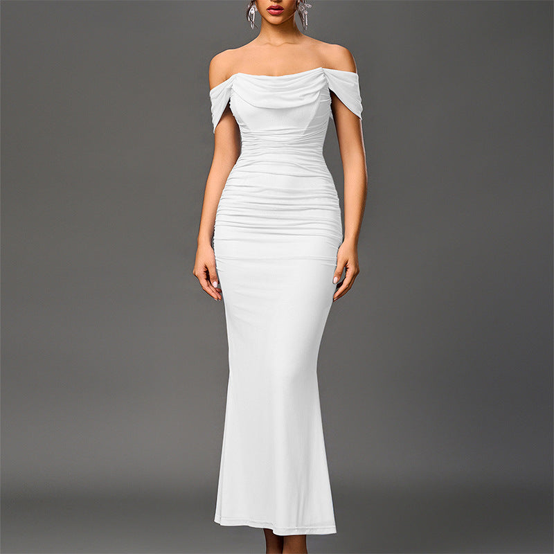 White off-shoulder ruched mermaid evening dress with draped shoulder detail