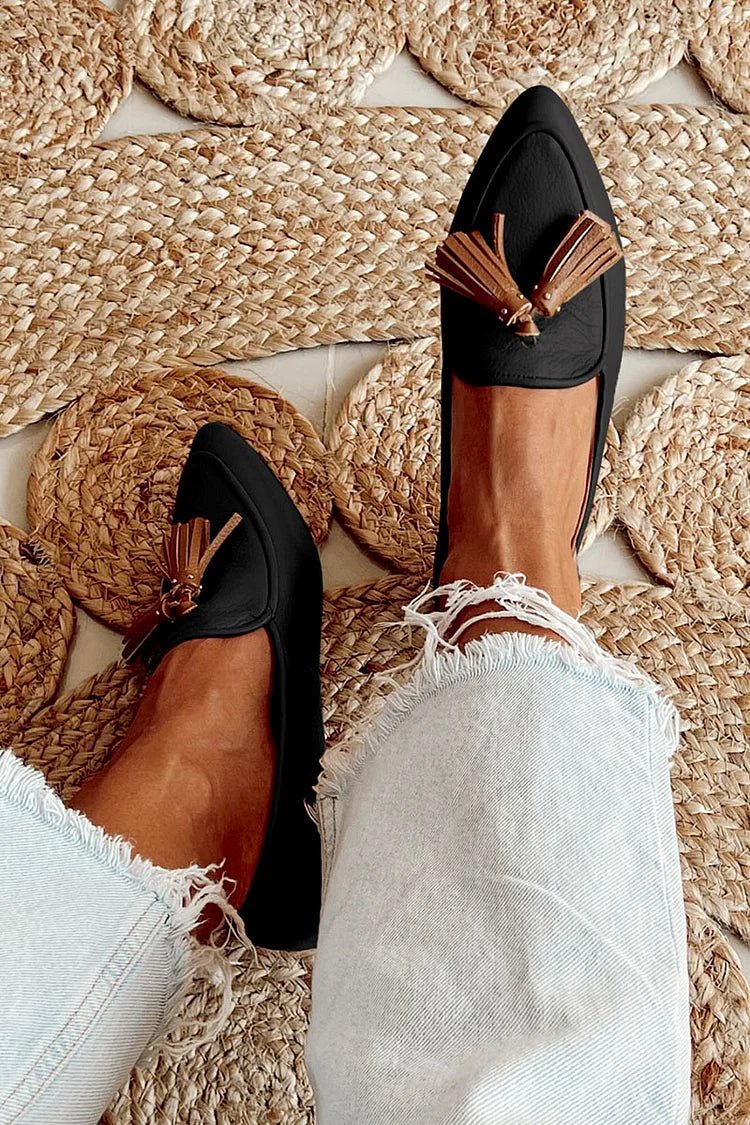 Women's black pointed tassel leather loafers, slip-on style with decorative tassel detail