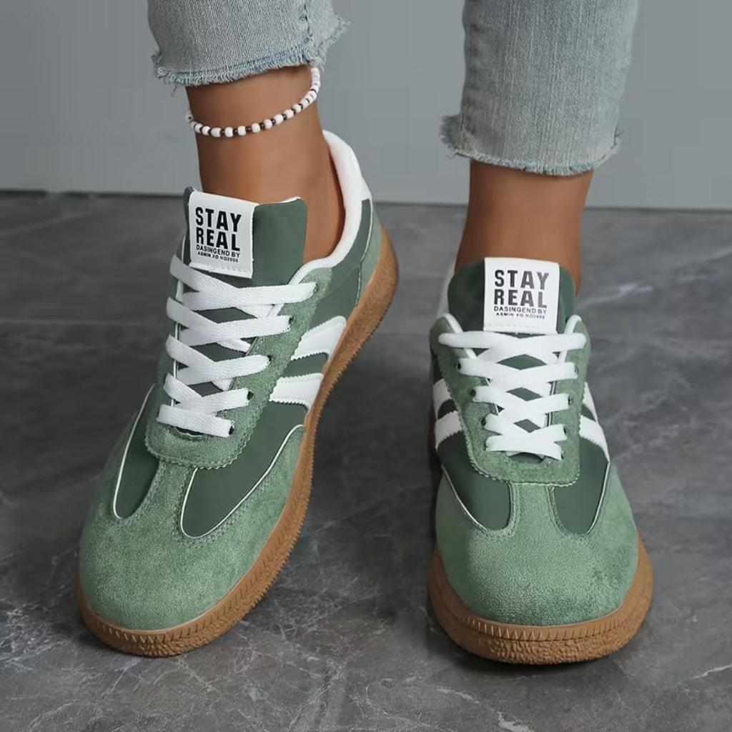Women’s comfort lace-up sneakers in green suede with white laces and gum sole