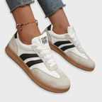 Women’s comfort lace-up sneakers in white and light gray with gum sole