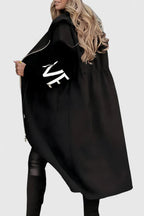 Black hooded long coat with front zip, drawstring, patch pockets, and large sleeve graphic.