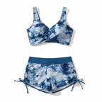 Blue tie-dye two-piece bikini set with underwire-style top and drawstring shorts