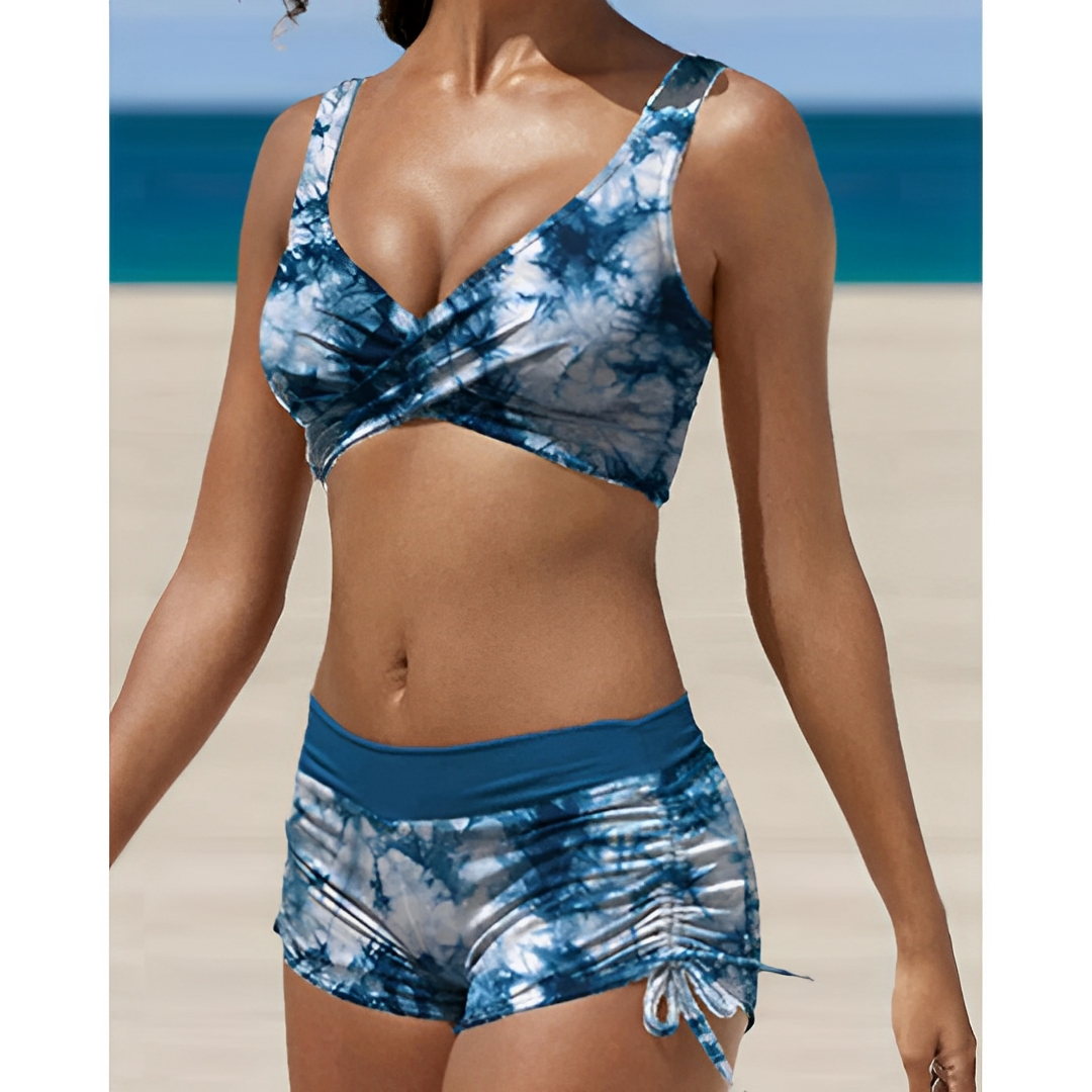 Blue tie-dye women's bikini with ruched V-neck bra top and drawstring shorts