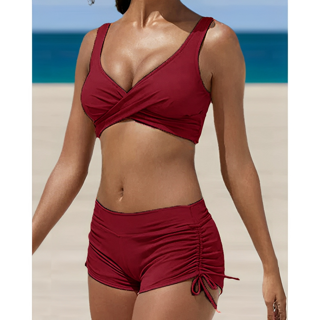 Wine red women's bikini two-piece with V-neck wrap top and ruched drawstring shorts
