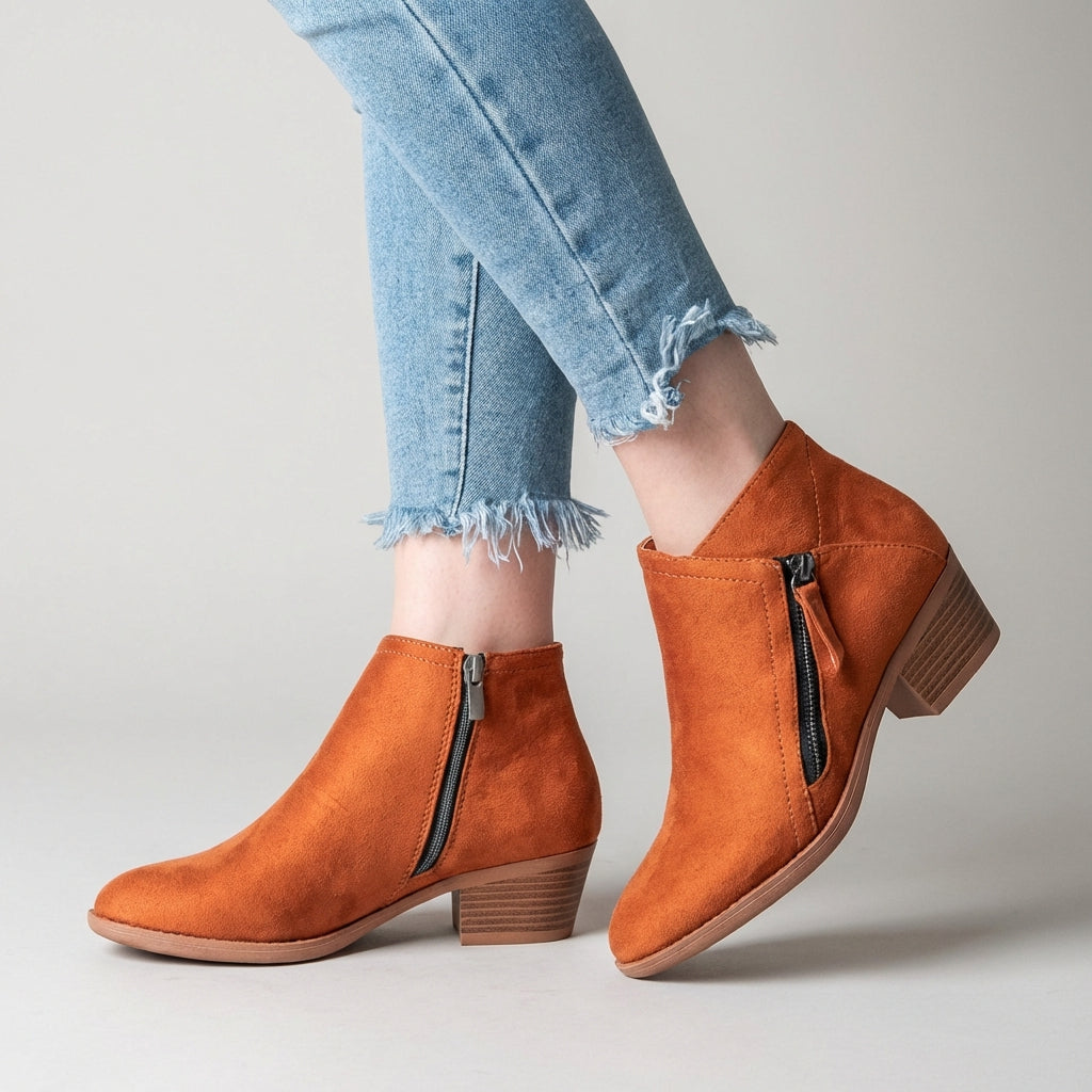 Women's orange ankle boots with side zipper and low block heel