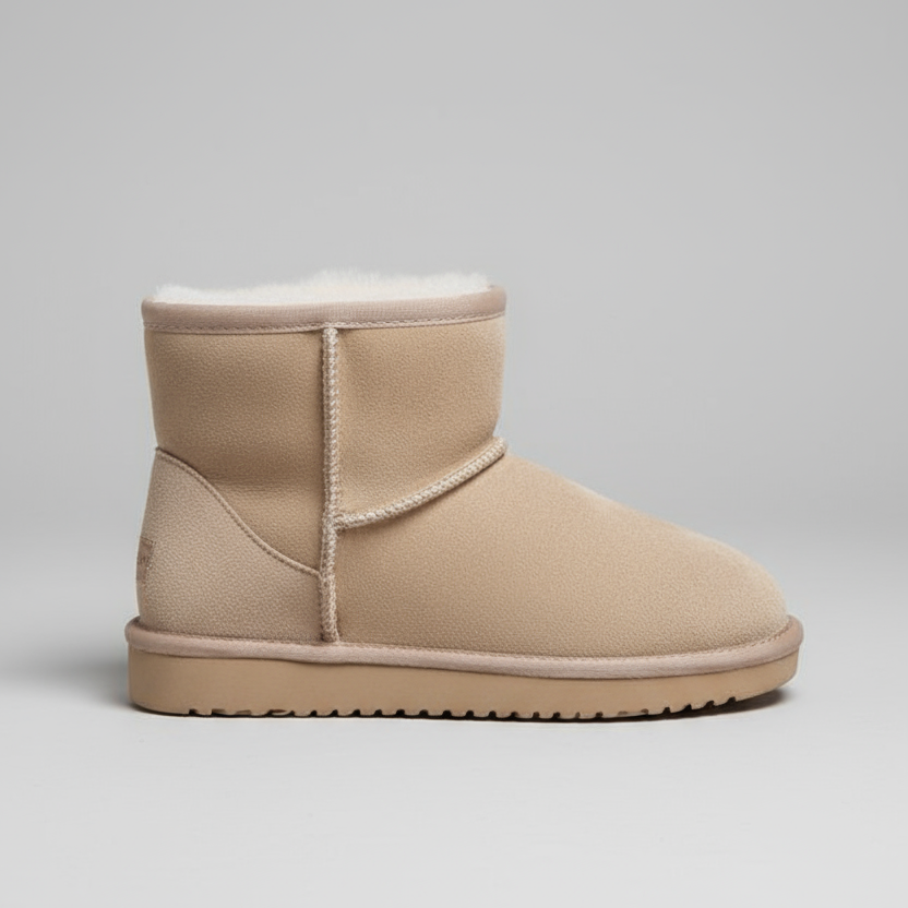 Women's beige ankle boots with faux fur lining and flat rubber sole
