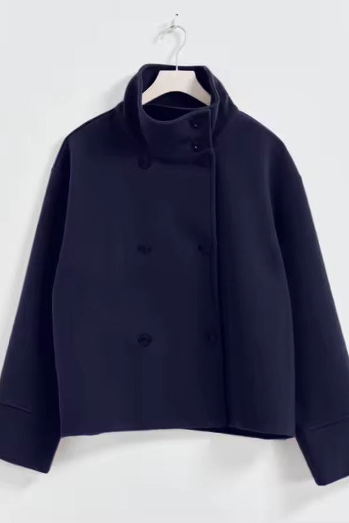Women’s relaxed double-breasted winter coat, dark navy, button closure on hanger