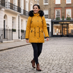 Women’s yellow parka coat with faux-fur trimmed hood, button front, cinched waist
