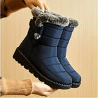 Women’s waterproof snow boots, dark blue with grey faux-fur cuffs and thick tread soles