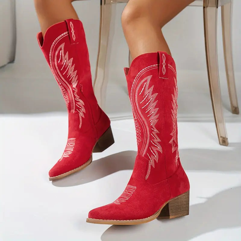 Red suede western boots with stitched side designs and wooden-look block heel