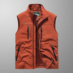 Red cargo vest with full-zip front, stand collar, and utility pockets on chest and sides