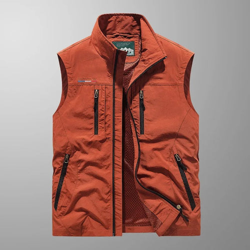Red cargo vest with full-zip front, stand collar, and utility pockets on chest and sides