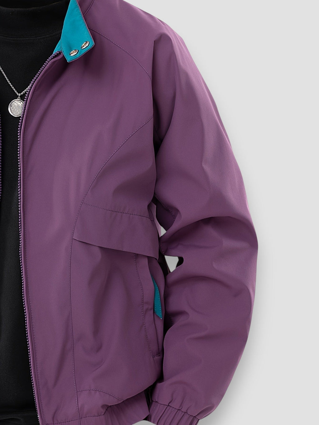 Purple lightweight spring jacket side view with full-zip front, snap pocket, and cuffed hem.