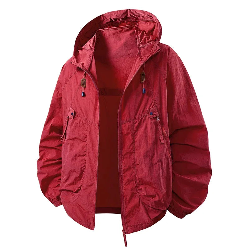 Red hooded lightweight jacket with zip front, pocket details, drawcord hem
