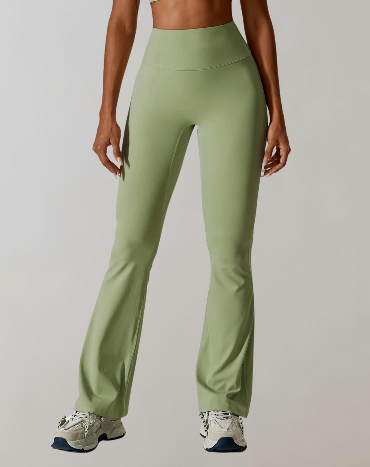Green high-waisted wide-leg yoga pants with smooth waistband and flared legs