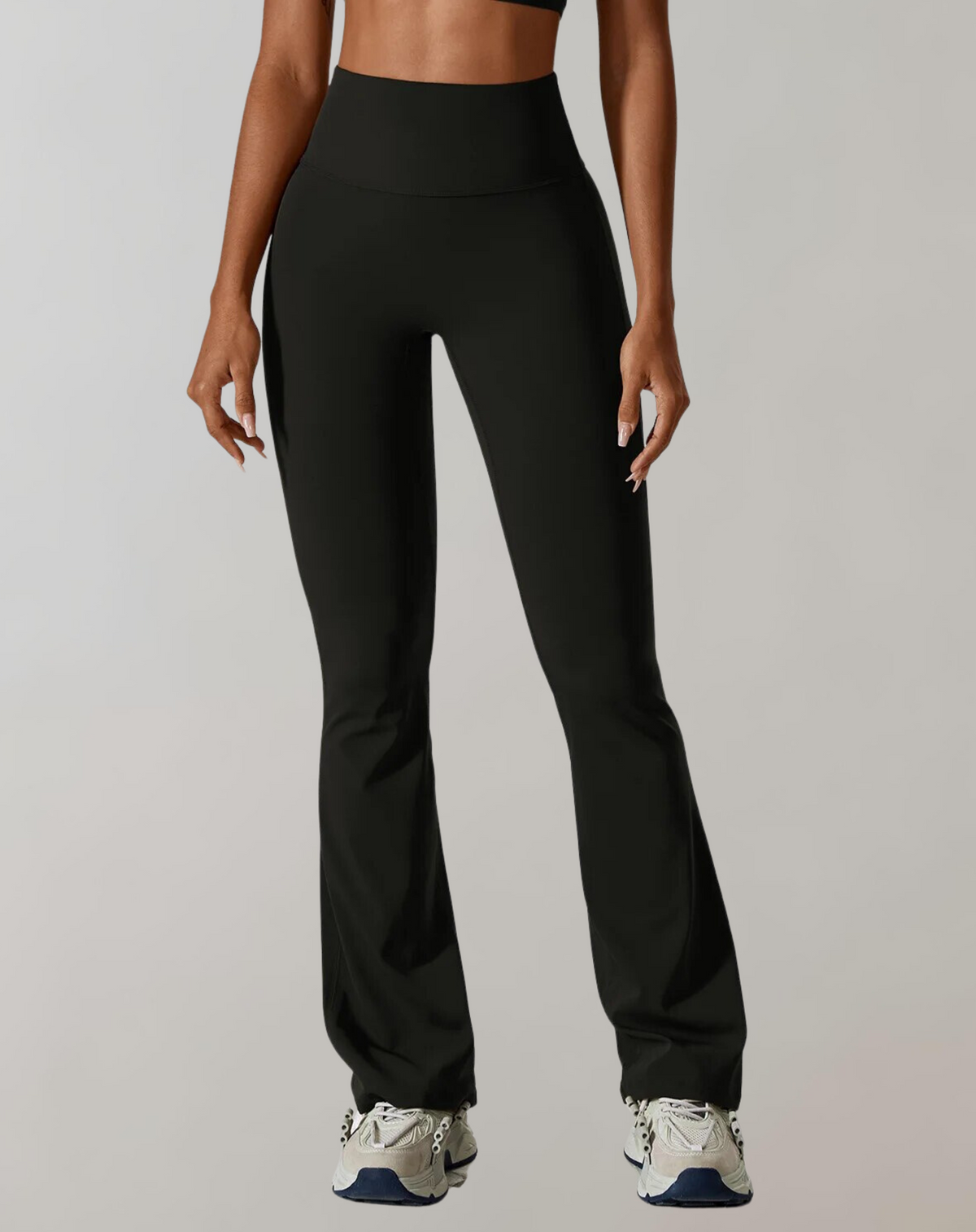 Black high-waisted wide-leg yoga pants with smooth waistband and wide flared legs