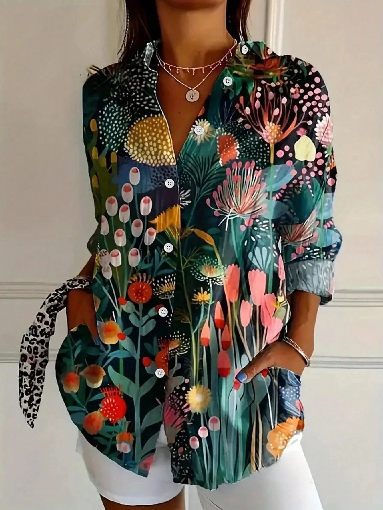 Dark multicolor abstract button-up blouse with collared neck, long sleeves, front buttons