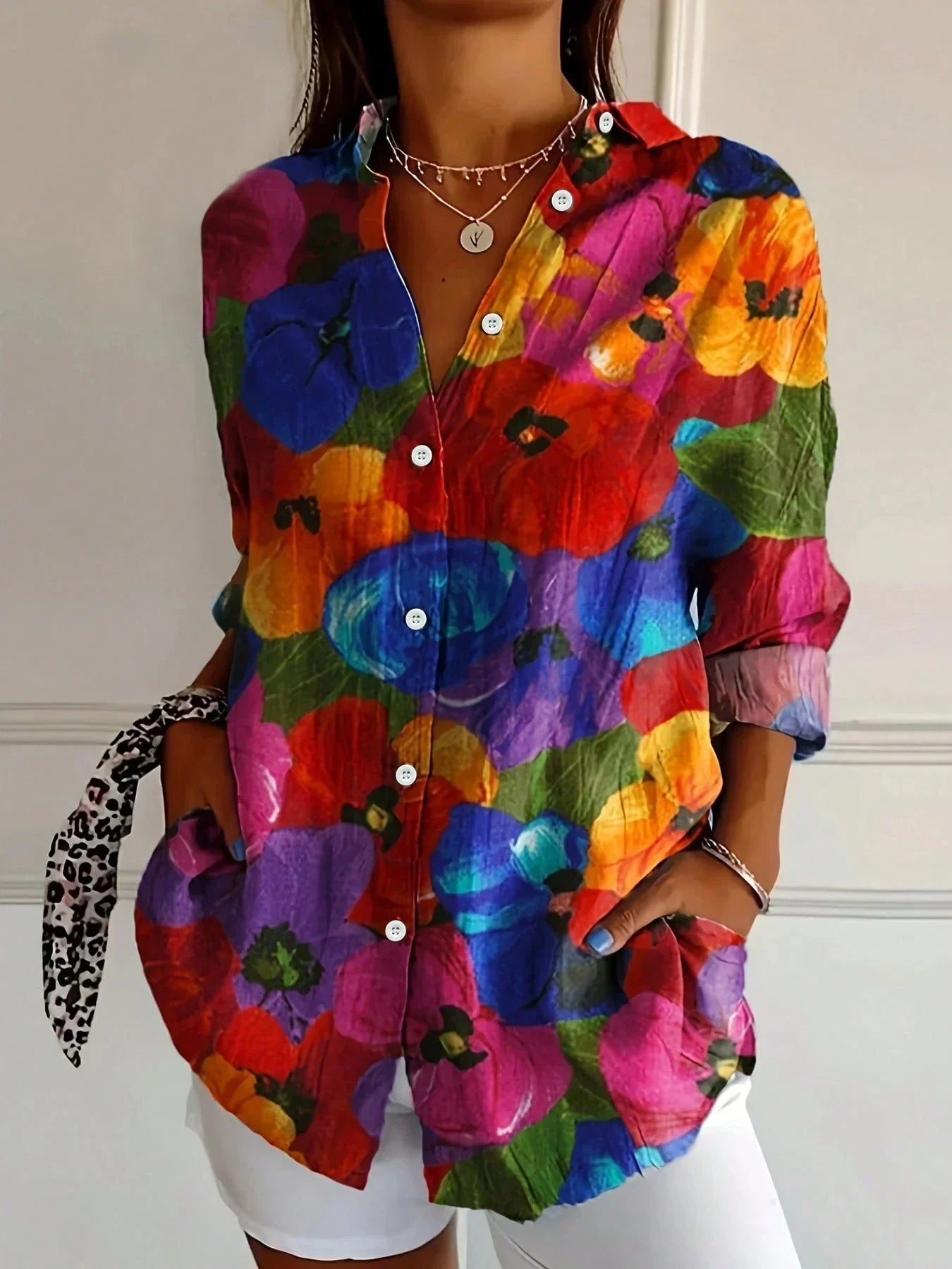 Colorful abstract button-up blouse with collared neck, long sleeves, front buttons