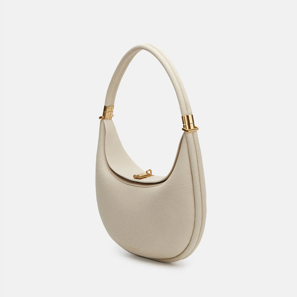 Ivory leather crossbody hobo bag with curved flap and gold-tone clasp