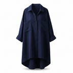 Navy women’s blouse with collar, button front, and chest pockets, three-quarter sleeves.