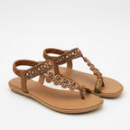 Tan flat open-toe sandals with beaded straps and gold-toned circular embellishments