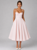 Pink corset bodice midi dress with sweetheart neckline, thin straps, full flared skirt.