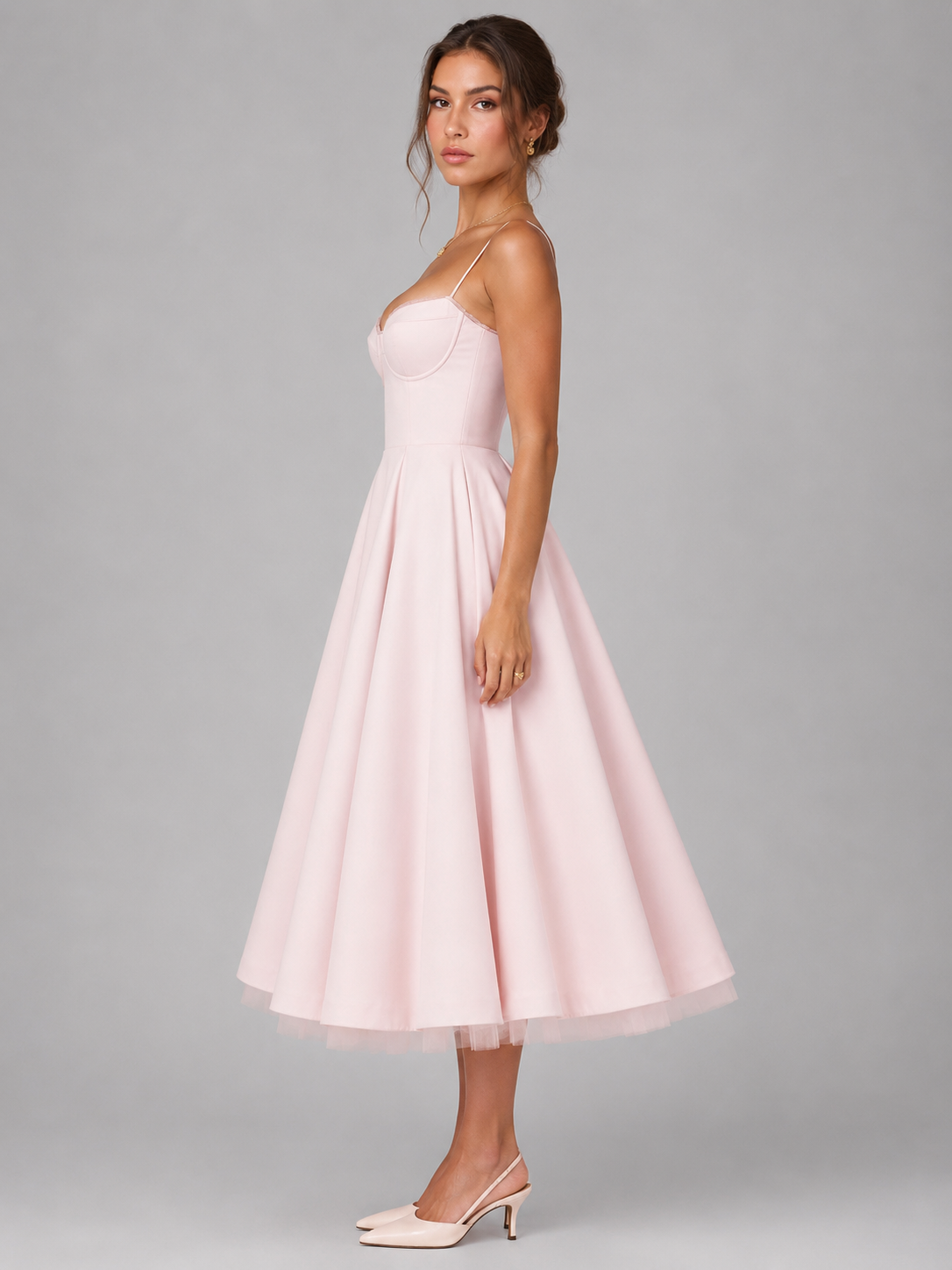 Pale pink corset bodice midi dress with sweetheart neckline and full flared skirt.