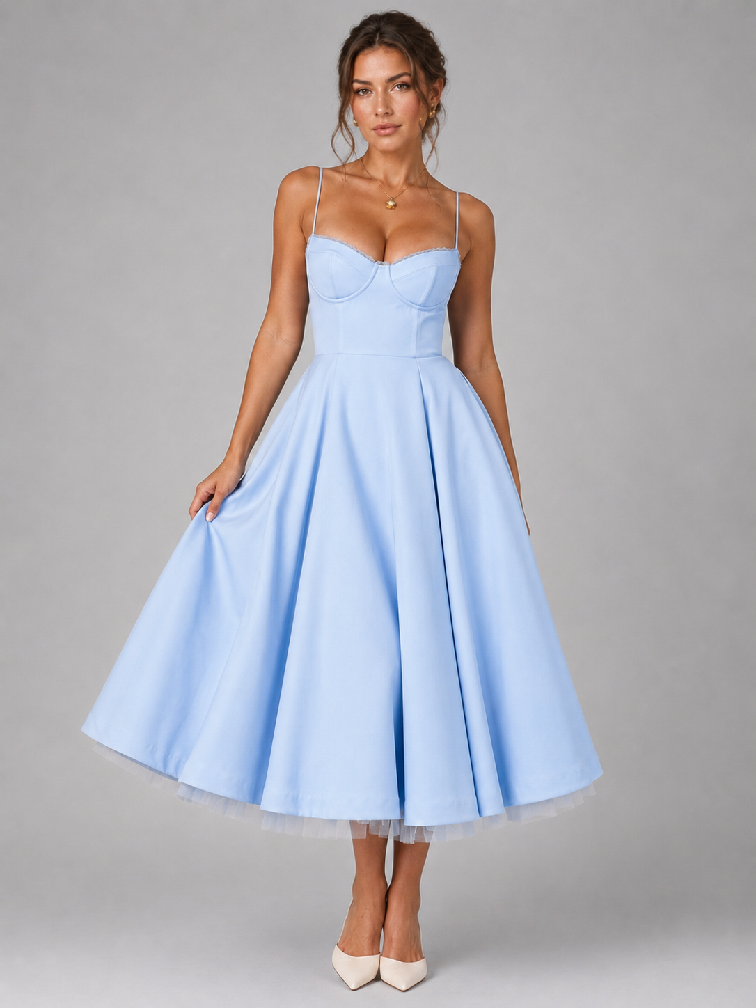 Light blue corset midi dress with sweetheart neckline, thin straps, and full flared skirt.