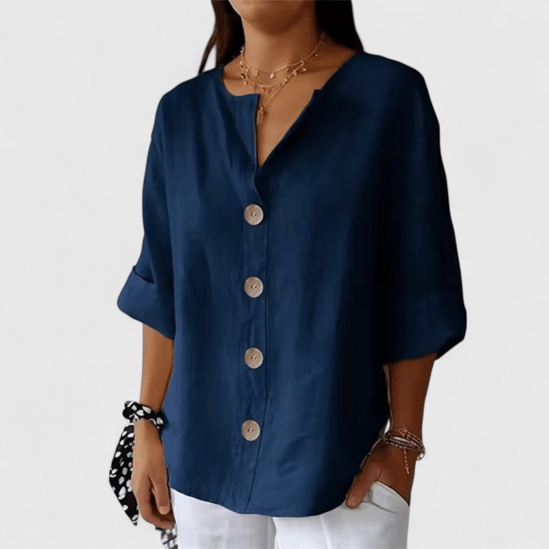 Navy women's V-neck button-front blouse, relaxed fit, short sleeves with bronze buttons