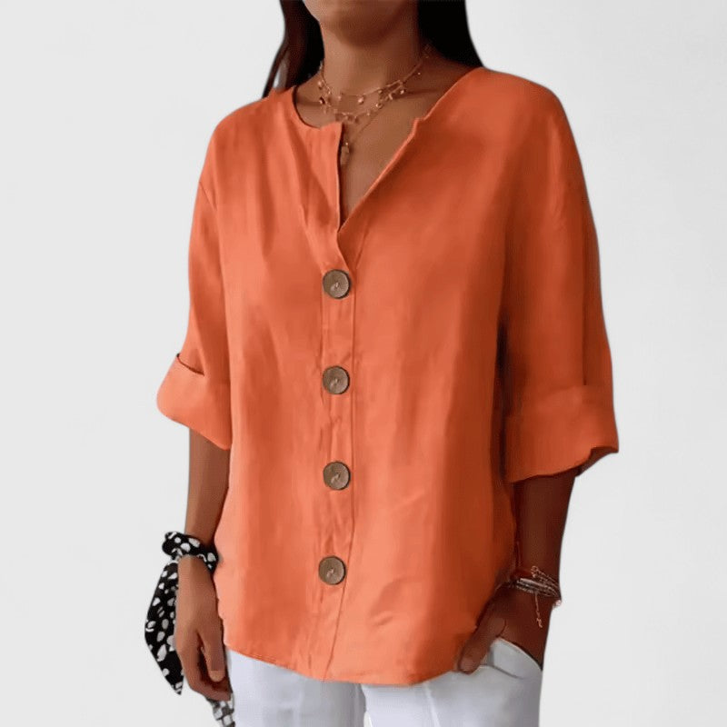 Orange women's V-neck button-front blouse, relaxed fit, short sleeves with bronze buttons