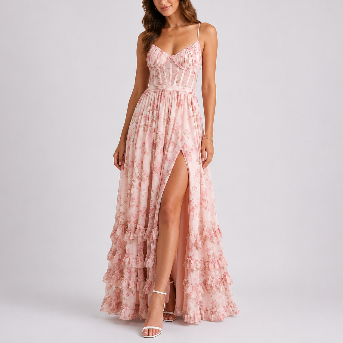 Pink floral corset maxi dress with adjustable spaghetti straps and tiered ruffle hem