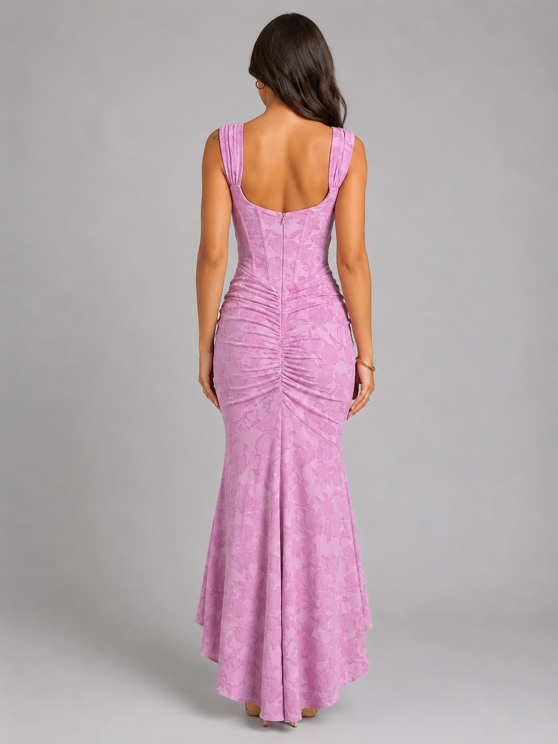 Pink floral corset maxi dress, sleeveless back view with ruched waist and asymmetrical hem