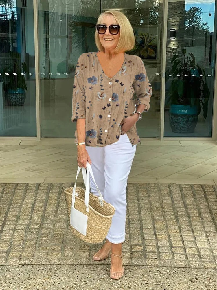 Women’s khaki floral V-neck blouse with 3/4 sleeves and button placket