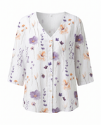Women’s white floral V-neck blouse with 3/4 sleeves and button-front placket