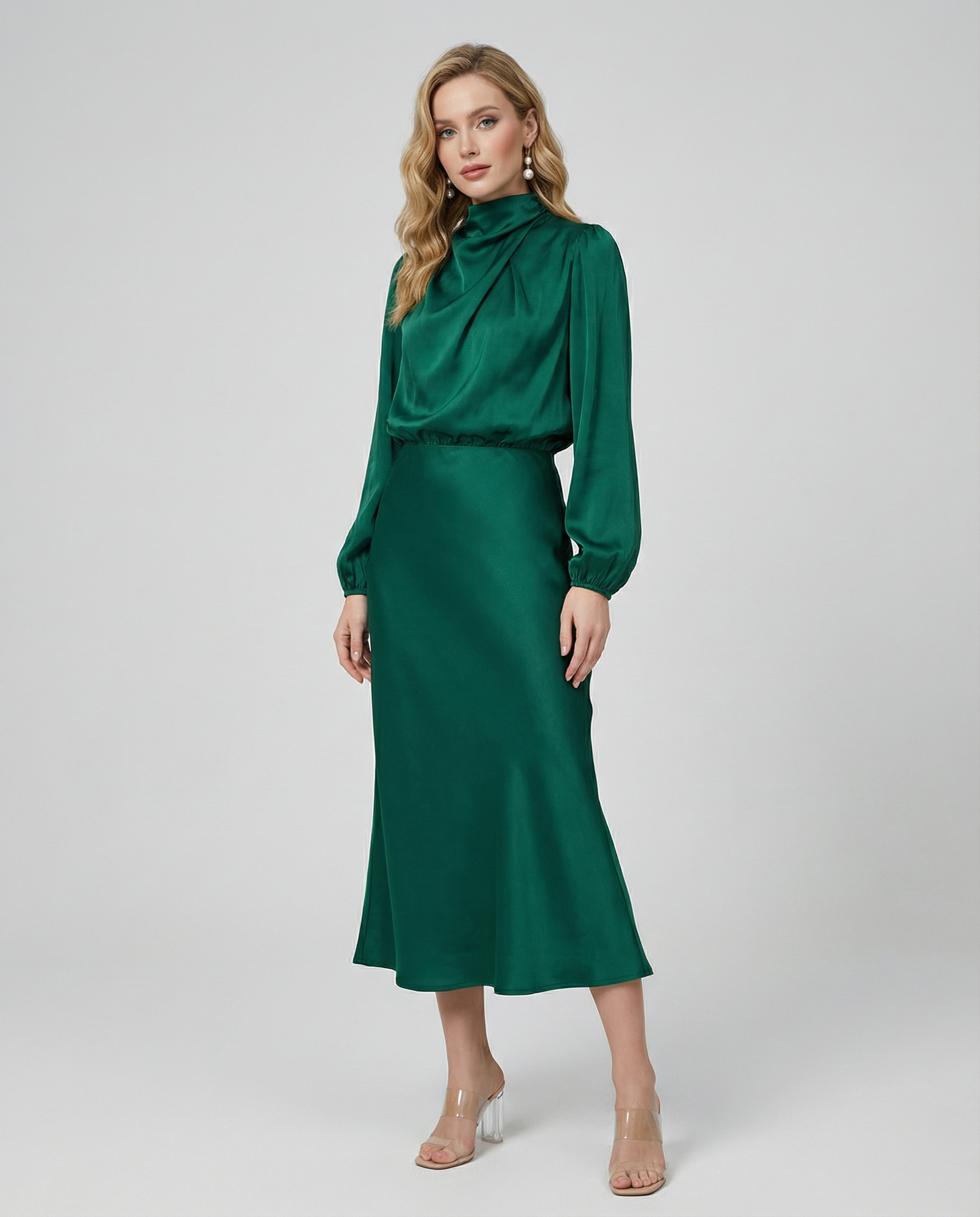 Deep green satin midi dress with long sleeves and high neckline, standing front view.