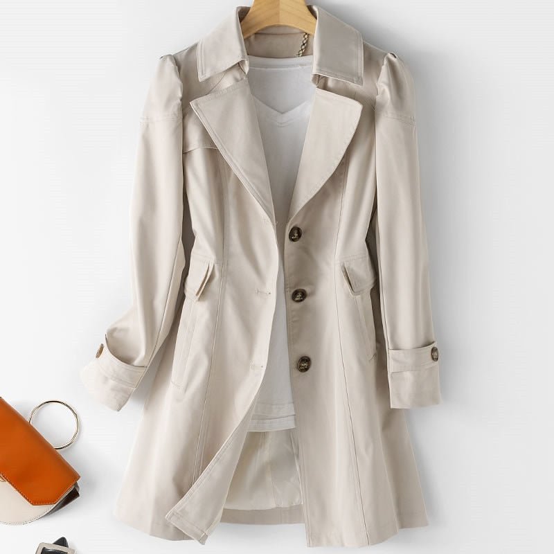Beige belted trench coat, double-breasted front, notched lapels, flap pockets