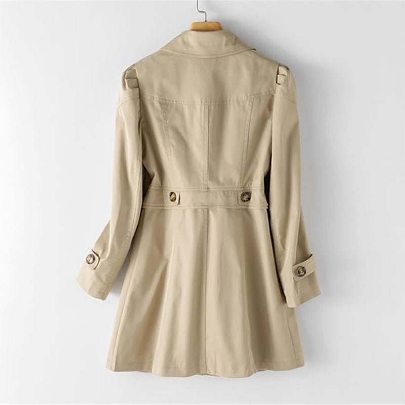 Beige trench coat back view, belt with buckle, buttoned sleeve tabs
