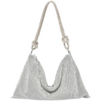 Silver glitter shoulder bag with short chain handles and curved top opening.