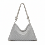 Silver glitter shoulder bag with short chain handles and curved front panel.
