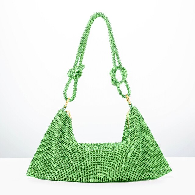 Green glitter shoulder bag with chain handles and wide curved opening.