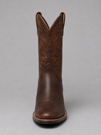 Brown leather cowboy boot with detailed western embroidery, stitched toe, stacked heel