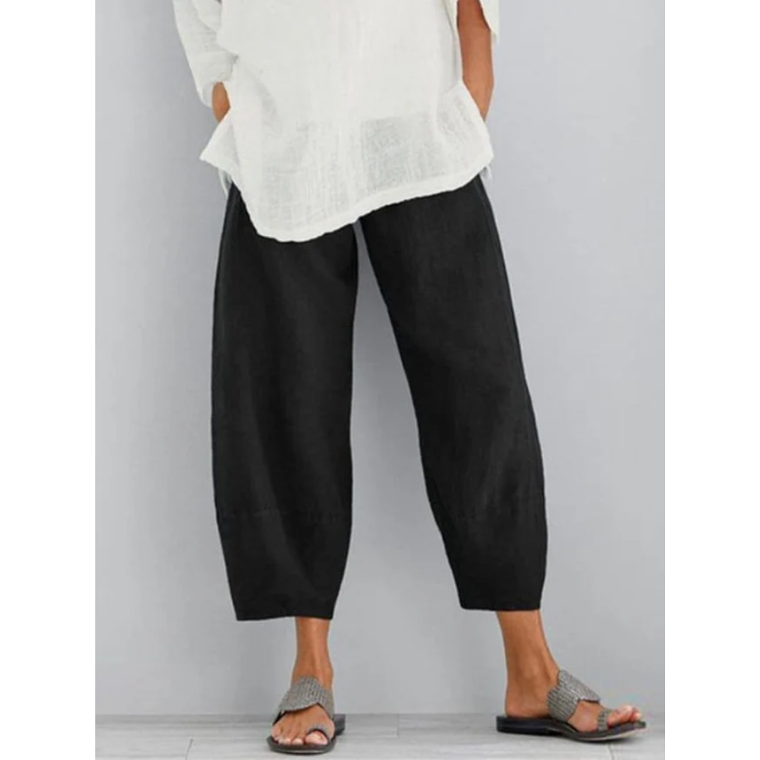 Black linen relaxed-fit leisure pants with wide legs and ankle cuffs